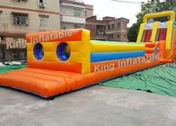 Ostacolo e scorrevole gonfiabili dei giochi di sport del tunnel arancio lungo di forma per i bambini