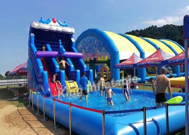 Slittamento e scorrevole gonfiabili blu commerciali con la grande piscina per l'adulto ed i bambini