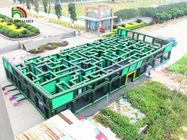 Giochi gonfiabili di sport del PVC di corsa ad ostacoli labirinto gigante gonfiabile verde/blu del laser
